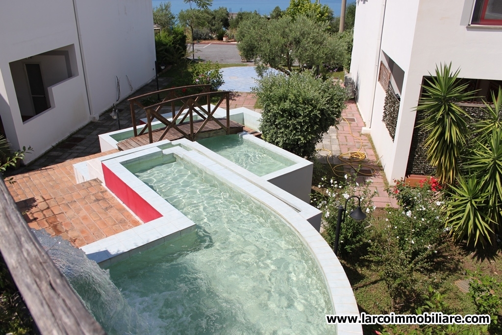Townhouse in a touristic complex with swimming pool