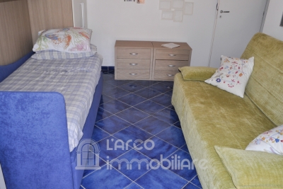 Trilocale al Piano Terra con Ampie Aree Esterne 