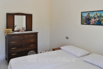  Soluzione Semi-Indipendente con Due Appartamenti e Garage 