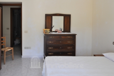  Soluzione Semi-Indipendente con Due Appartamenti e Garage 